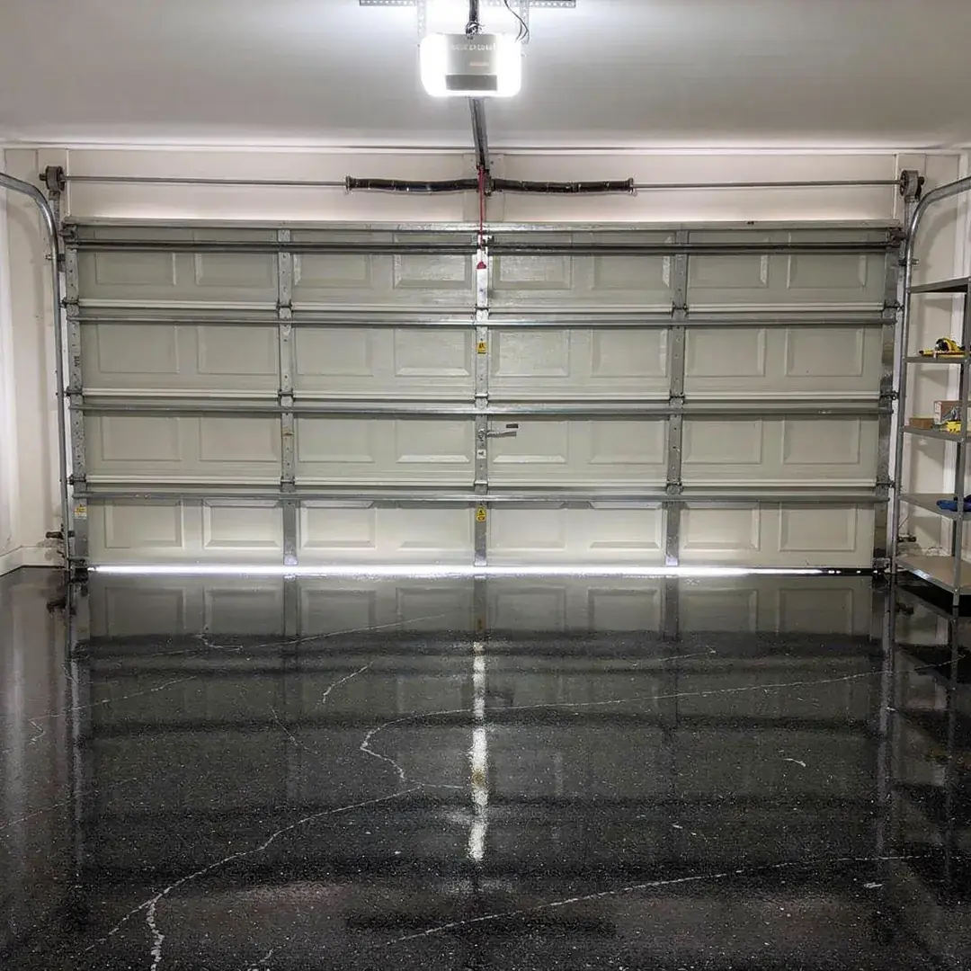 Carbon (F9202) flake polyaspartic garage floor